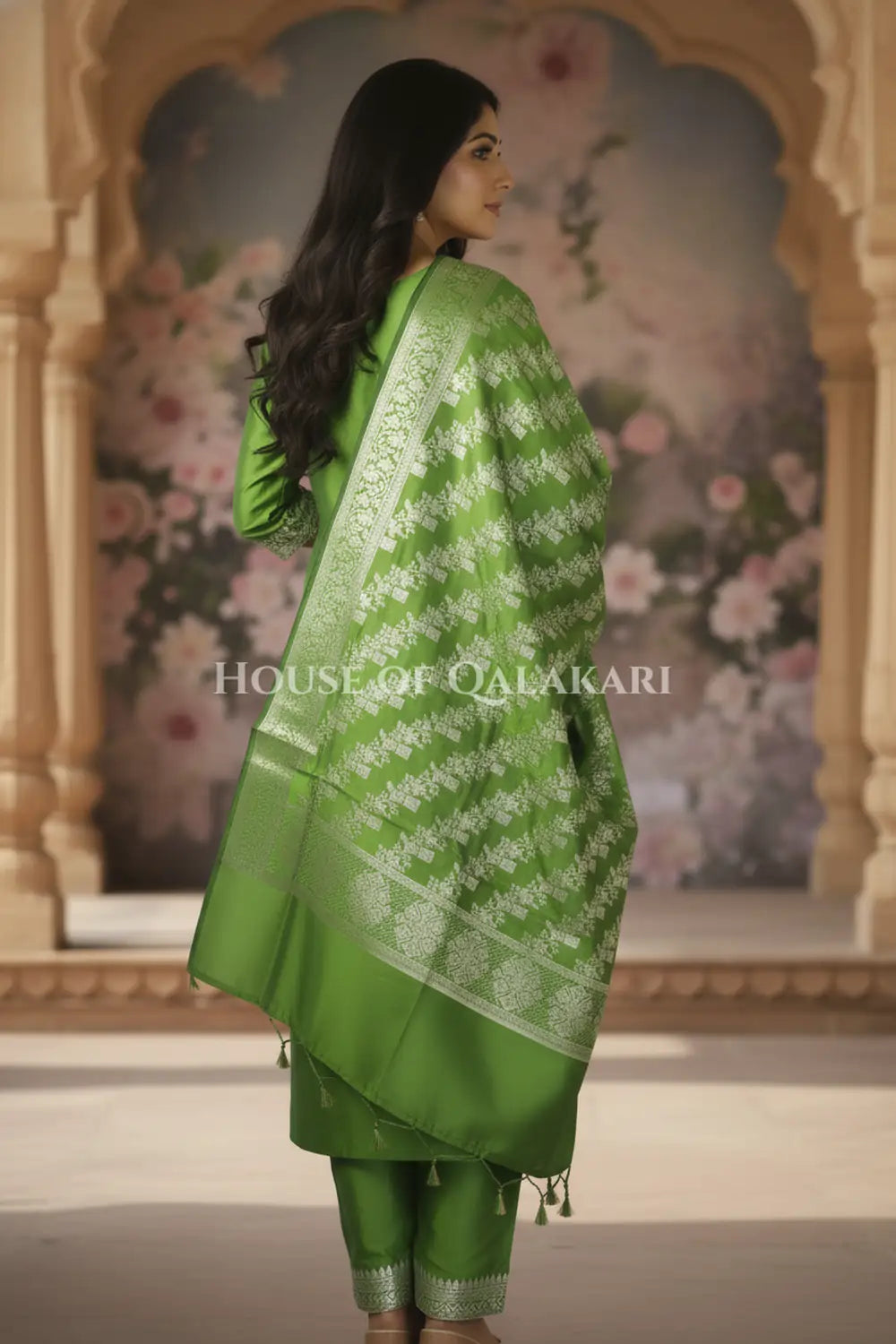 Banarasi silk Unstitched Dress Material in Light Olive Green and with lotus floral border and diagonal striped zari work dupatta – back pose