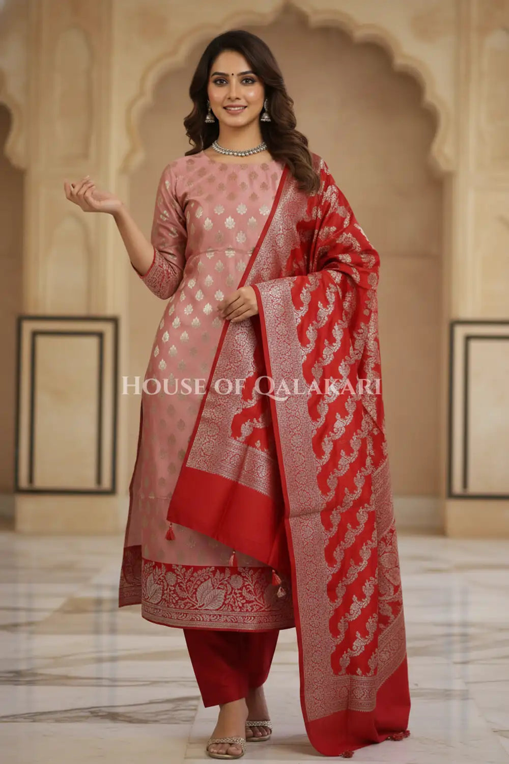 Banarasi Silk Unstitched Dress Material in Rose Pink and Red contrast with Intricate Zari Buti – festive pose