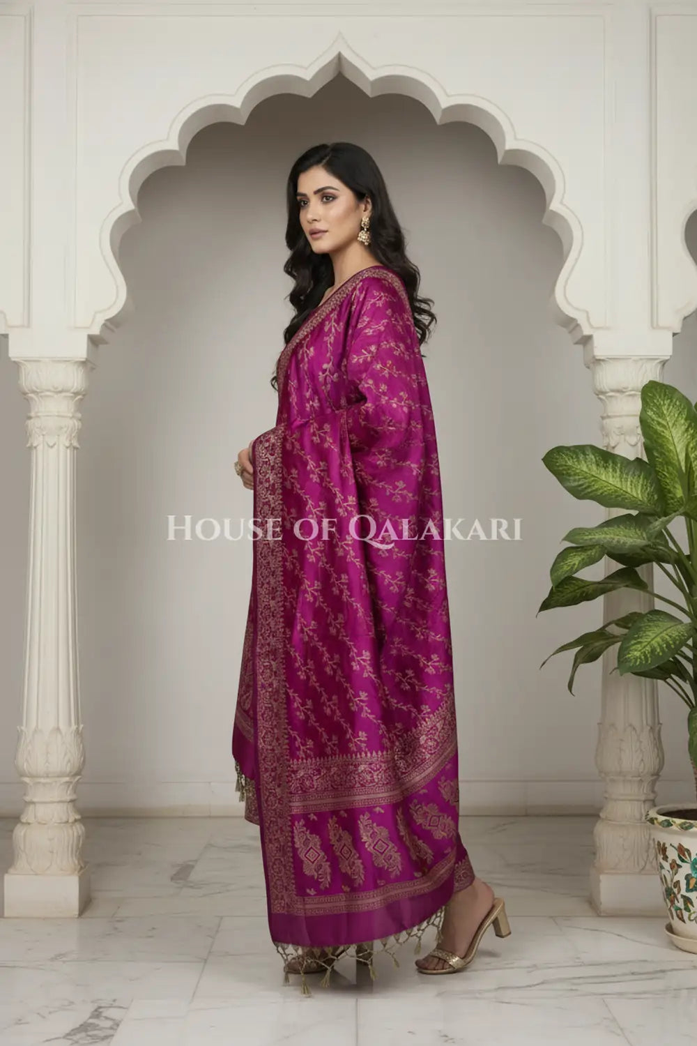 Banarasi Unstitched Dress Material in Rich Purple and with plain body and resham border and diagonally striped resham dupatta – side pose