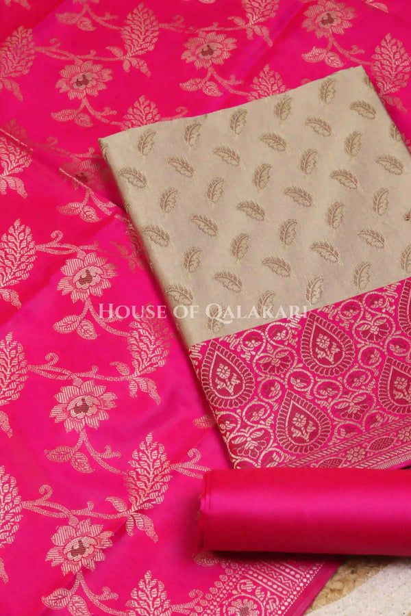 Banarasi Unstitched Dress Material in Mushroom and with all over leaf buti and resham border along with floral resham jaal dupatta – product