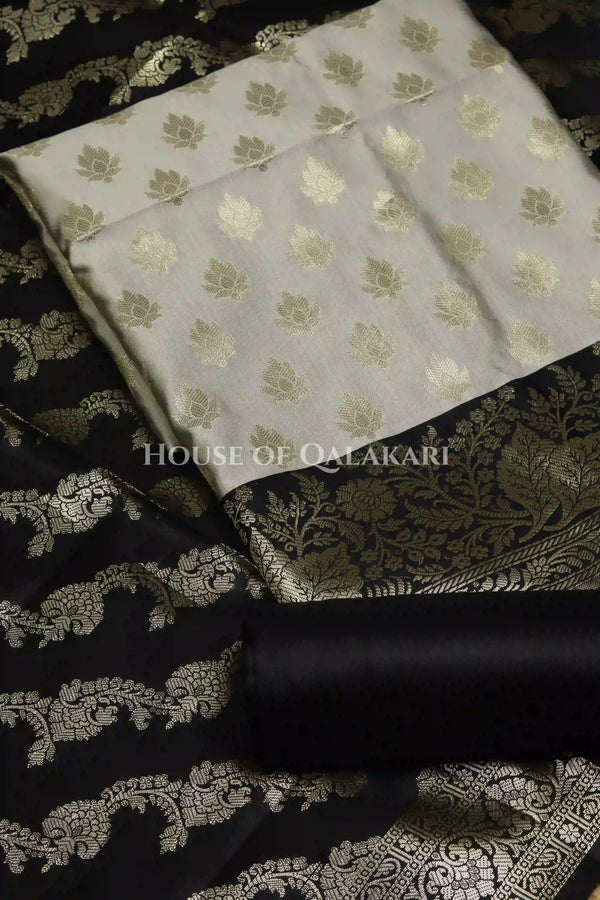 Banarasi Silk Unstitched Dress Material in light grey and black contrast with Intricate Zari Buti – product
