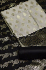 Banarasi Silk Unstitched Dress Material in light grey and black contrast with Intricate Zari Buti – product