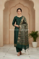 Banarasi Cotton Silk blend Unstitched Dress Material in Bottle Green and with gol buti( Polka dots) inspired work – front pose