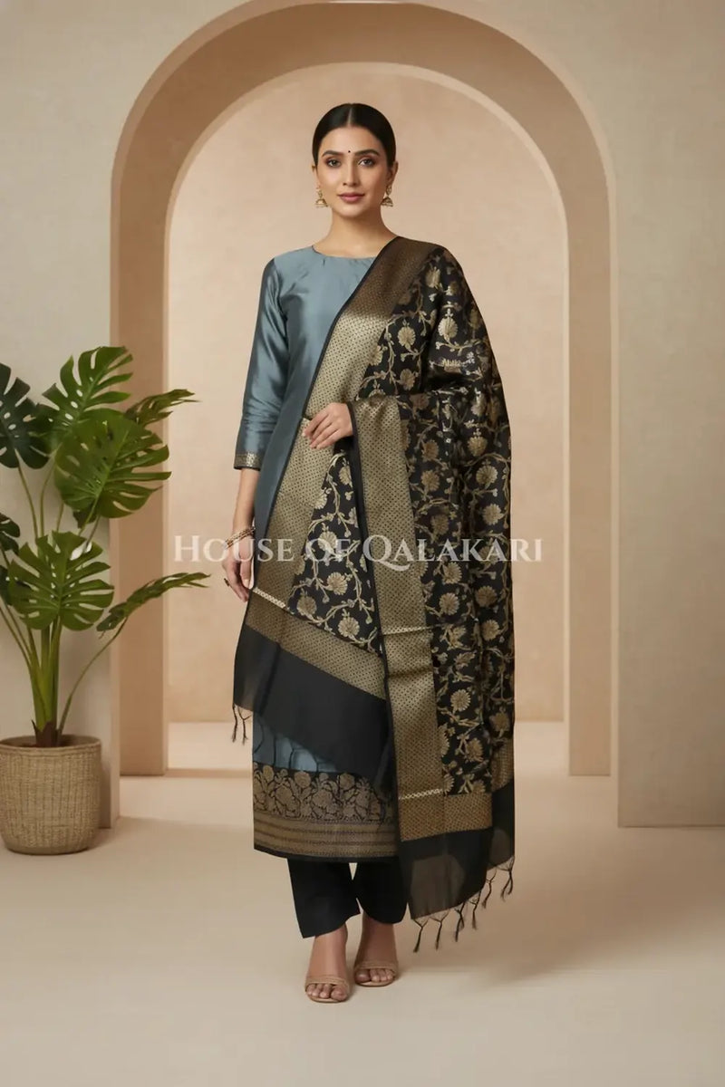 Banarasi silk Unstitched Dress Material in grey and black contrast with Intricate Zari Buti – front pose