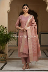 Banarasi Chanderi Cotton Unstitched Dress Material in Copper rose and with matching floral vine jaal dupatta – festive pose
