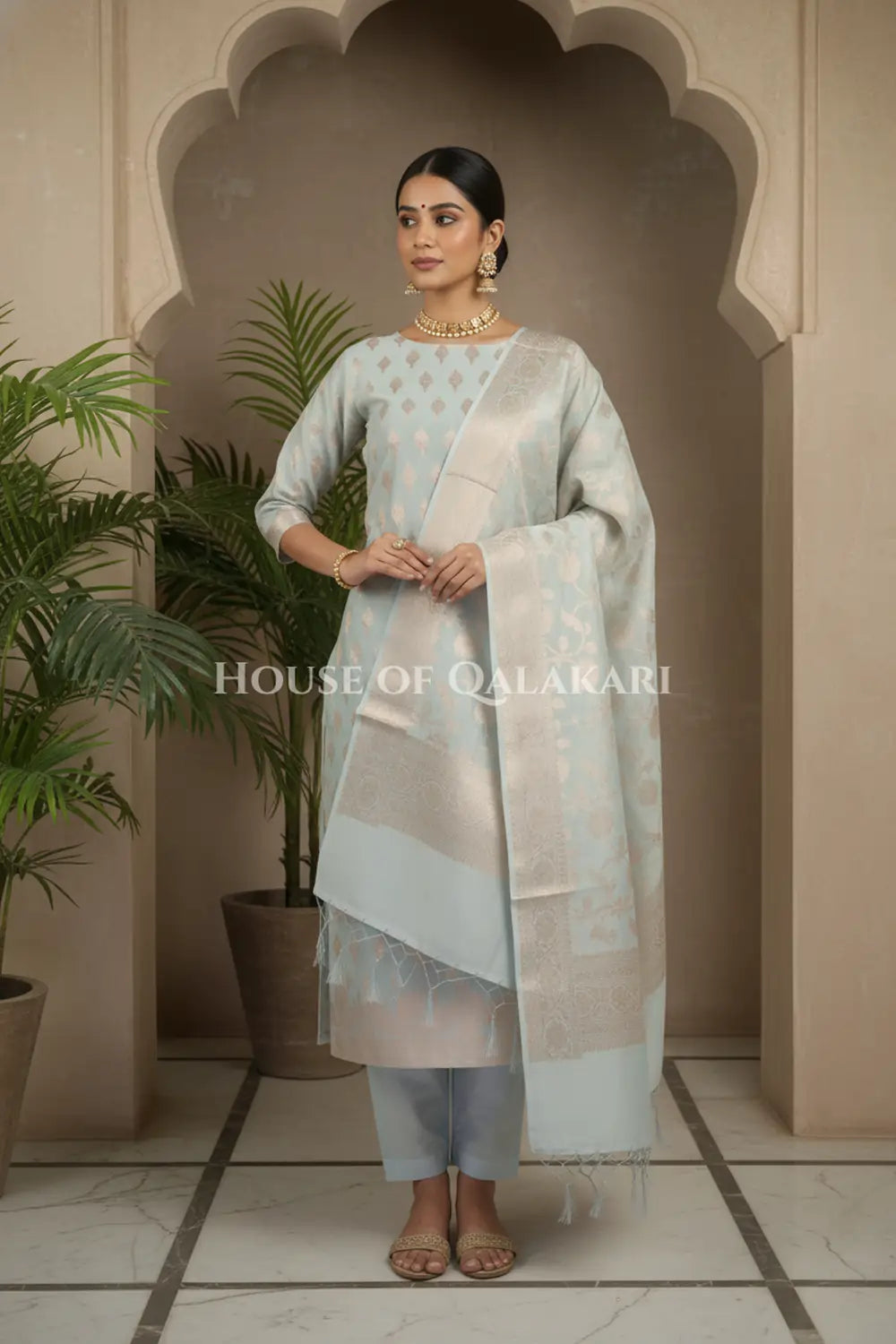 Banarasi Chanderi Cotton Unstitched Dress Material in Ash Grey with intricate Zari Buti work – dramatic pose