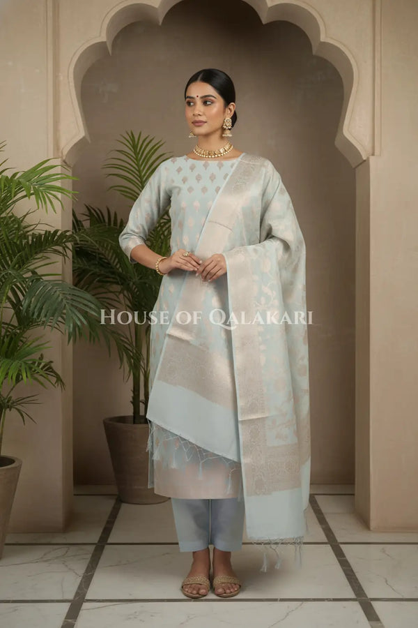 Banarasi Chanderi Cotton Unstitched Dress Material in Ash Grey with intricate Zari Buti work – dramatic pose