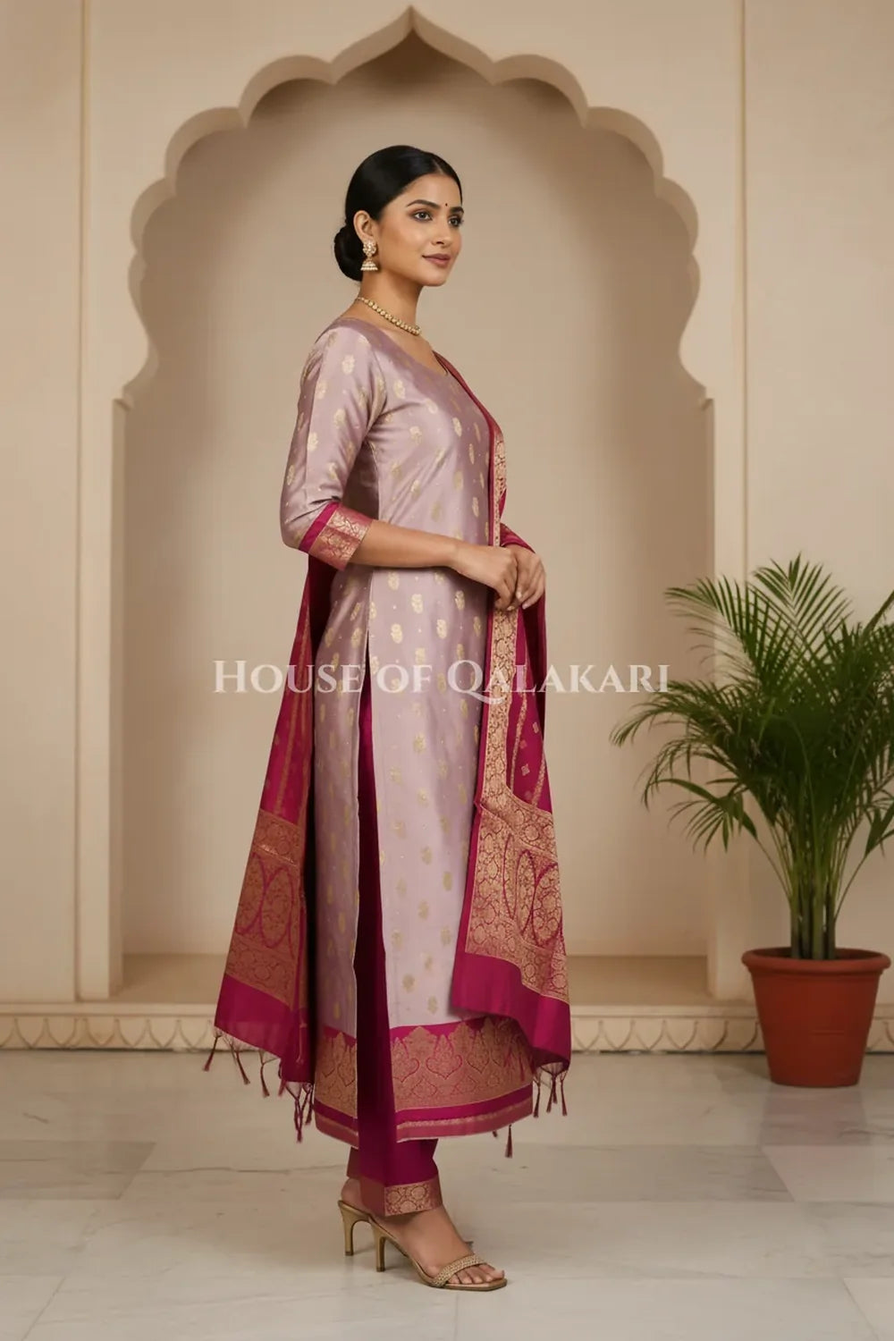 Banarasi Silk in lilac and magenta contrast with Intricate Zari Buti – side pose
