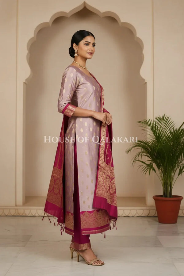 Banarasi Silk in lilac and magenta contrast with Intricate Zari Buti – side pose