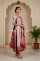 Banarasi Silk in lilac and magenta contrast with Intricate Zari Buti – side pose