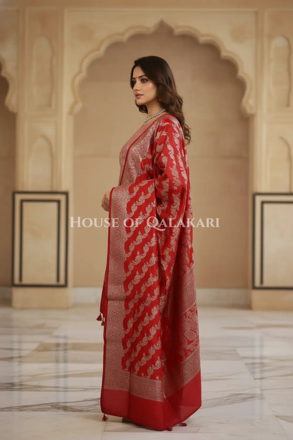 Banarasi Silk Unstitched Dress Material in Rose Pink and Red contrast with Intricate Zari Buti – side pose