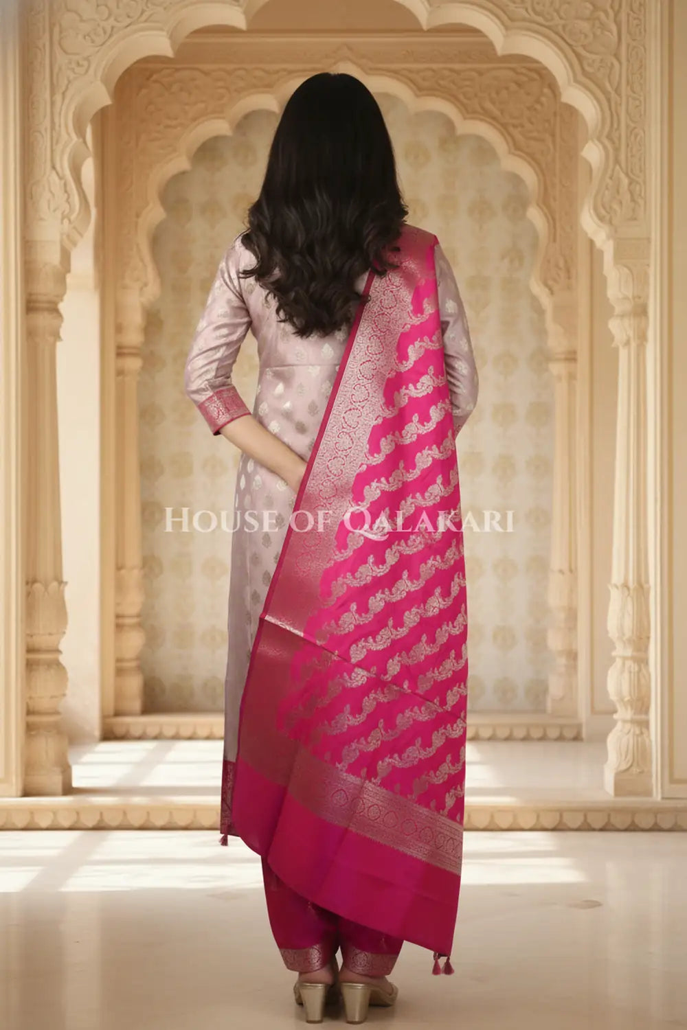 Banarasi Silk Unstitched Dress Material in Light Purple and rani pink contrast with Intricate Zari Buti – back pose