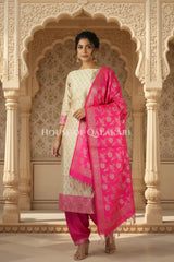 Banarasi Unstitched Dress Material in Mushroom and with all over leaf buti and resham border along with floral resham jaal dupatta – front pose