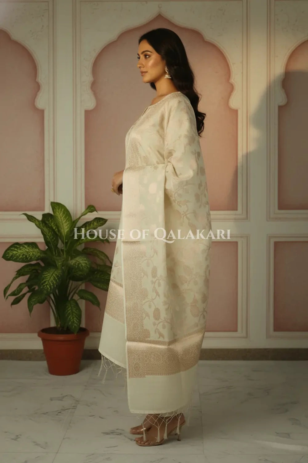 Banarasi Chanderi Cotton Unstitched Dress Material in Cream with intricate Zari Buti work – side pose