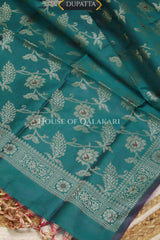 Banarasi Unstitched Dress Material in Silver Green and with all over leaf buti and resham border along with floral resham jaal dupatta – dupatta