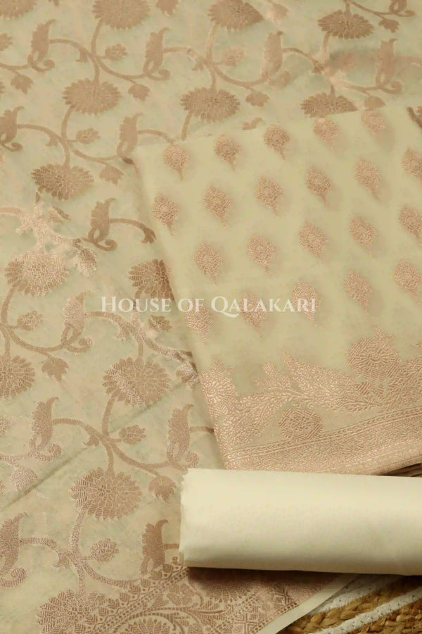 Banarasi Chanderi Cotton Unstitched Dress Material in Cream with intricate Zari Buti work – product