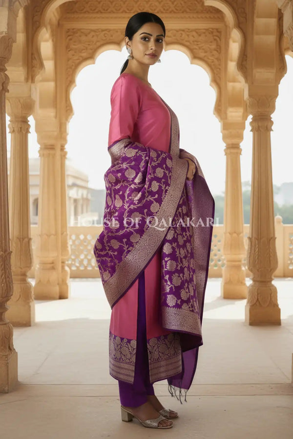Banarasi silk Unstitched Dress Material in Rose Pink and Dark Purple contrast with Intricate Zari Buti – side pose