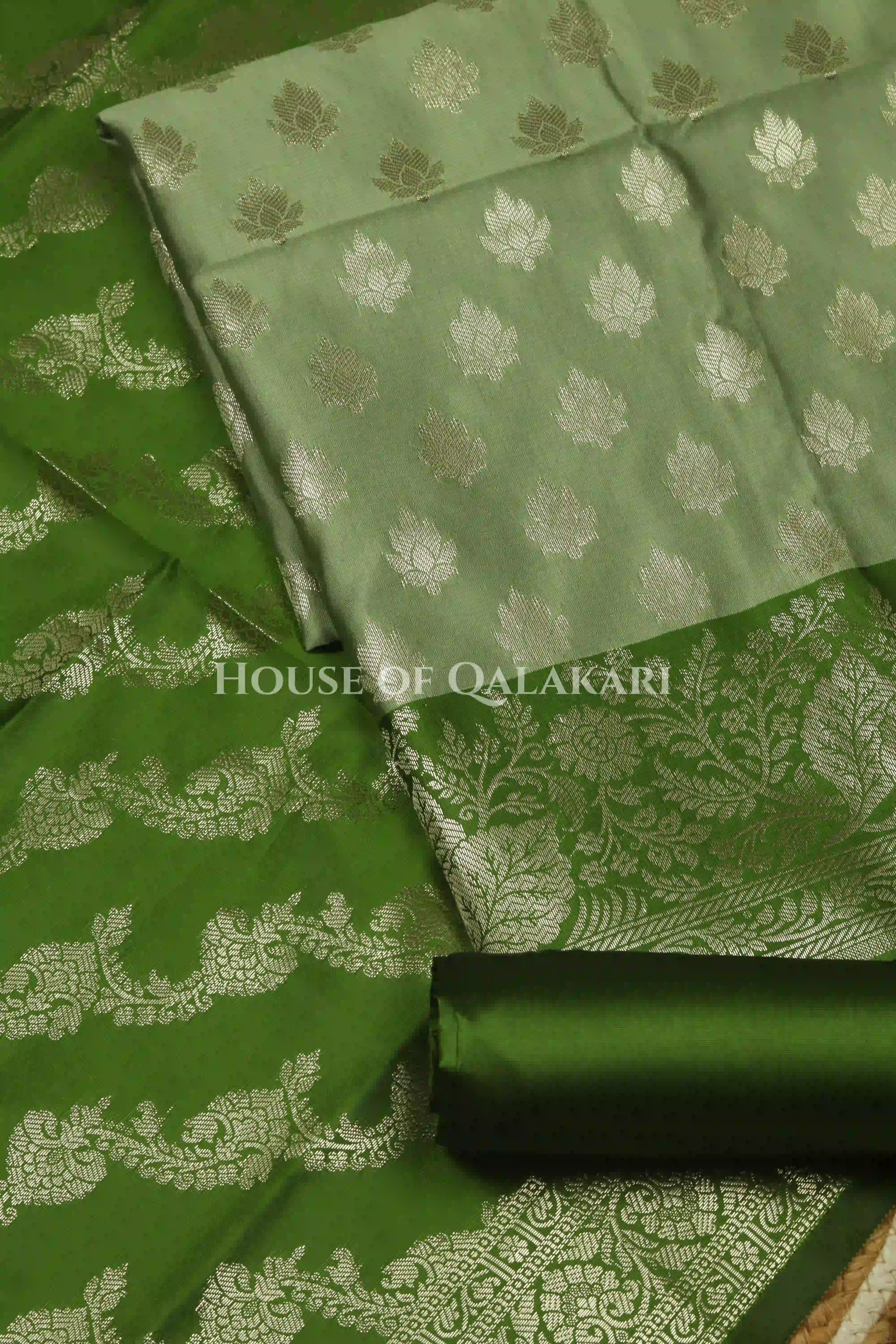 Banarasi Silk Unstitched Dress Material in Sage Green and Green contrast with Intricate Zari Buti – product