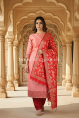 Banarasi Unstitched Dress Material in Rose Pink and with all over leaf buti and resham border along with floral resham jaal dupatta – front pose