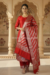 Banarasi silk Unstitched Dress Material in Red and with lotus floral border and diagonal striped zari work dupatta – front pose