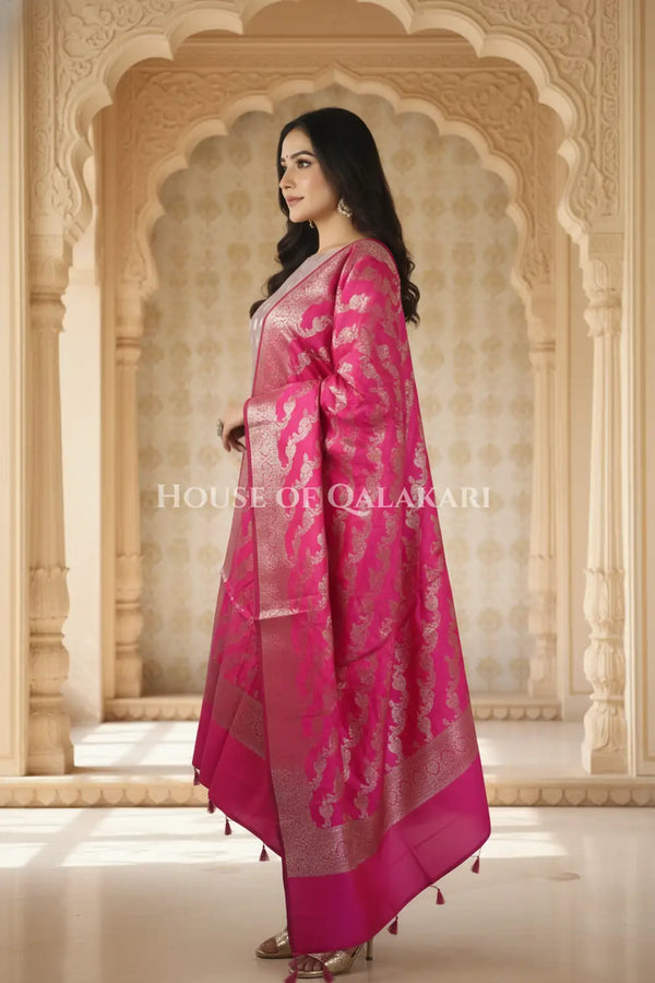 Banarasi Silk Unstitched Dress Material in Light Purple and rani pink contrast with Intricate Zari Buti – side pose