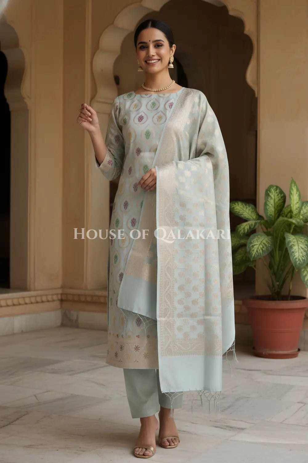 Banarasi Chanderi Cotton Unstitched Dress Material in Pale Silver and with matching floral vine jaal dupatta – festive pose