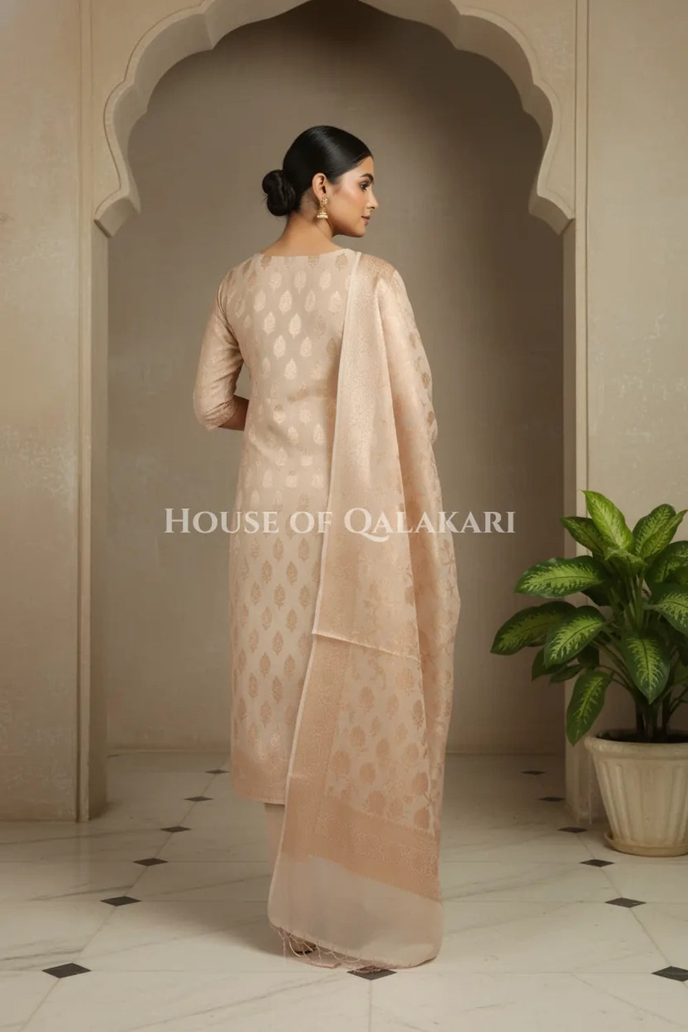 Banarasi Chanderi Cotton Unstitched Dress Material in Champagne beige with intricate Zari Buti work – back pose