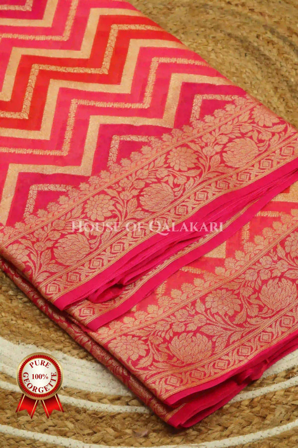 Khaddi Banarasi Saree in Orange & Pink tones with zig-zag chevron wave