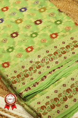 Khaddi Banarasi Saree in light olive green with all over floral jaal butis