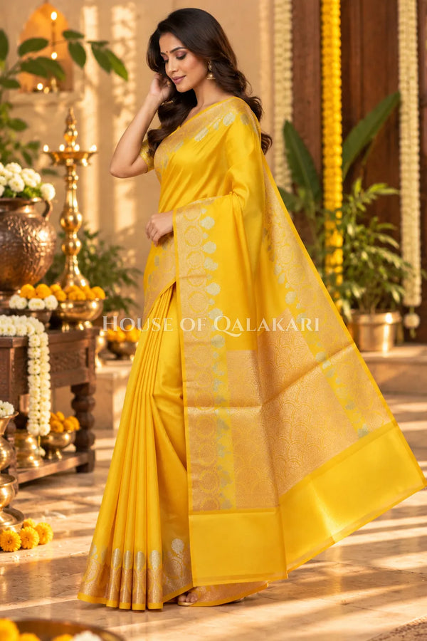 Banarasi Raw Mango Silk Saree in Yellow with Plain Body & Floral Zari Border & Pallu