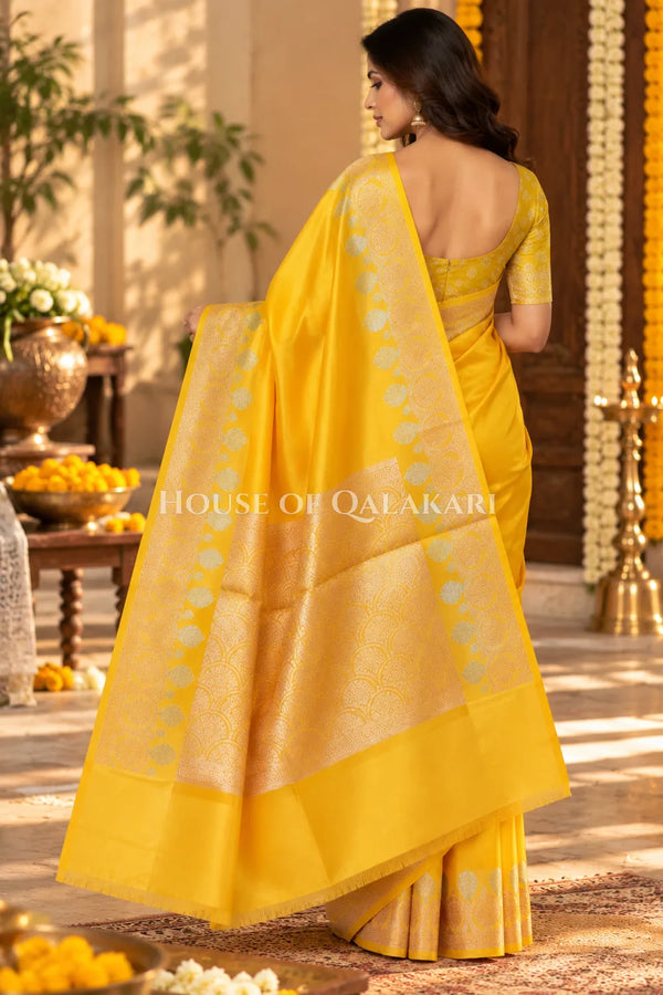 Banarasi Raw Mango Silk Saree in Yellow with Plain Body & Floral Zari Border & Pallu