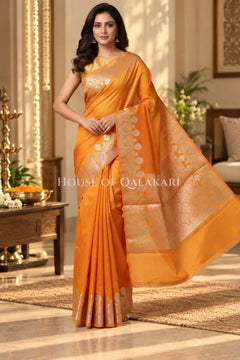 Banarasi Raw Mango Silk Saree in Orange with Plain Body & Floral Zari Border & Pallu
