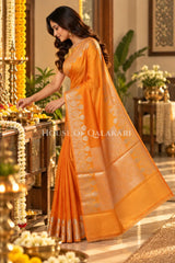 Banarasi Raw Mango Silk Saree in Orange with Plain Body & Floral Zari Border & Pallu