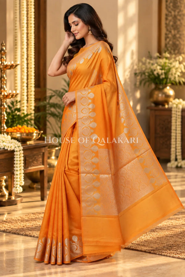 Banarasi Raw Mango Silk Saree in Orange with Plain Body & Floral Zari Border & Pallu
