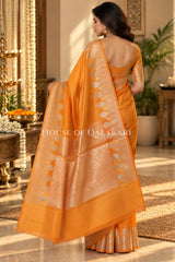 Banarasi Raw Mango Silk Saree in Orange with Plain Body & Floral Zari Border & Pallu