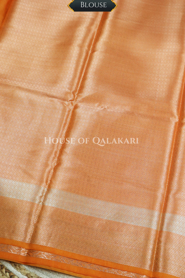 Banarasi Raw Mango Silk Saree in Orange with Plain Body & Floral Zari Border & Pallu