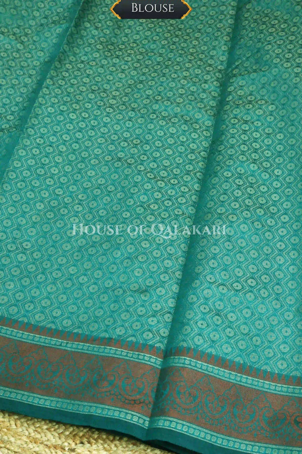 Blue-Green Banarasi Mulmul cotton patola Saree with Geometric Floral Cross Buti & contrast rust-maroon Border