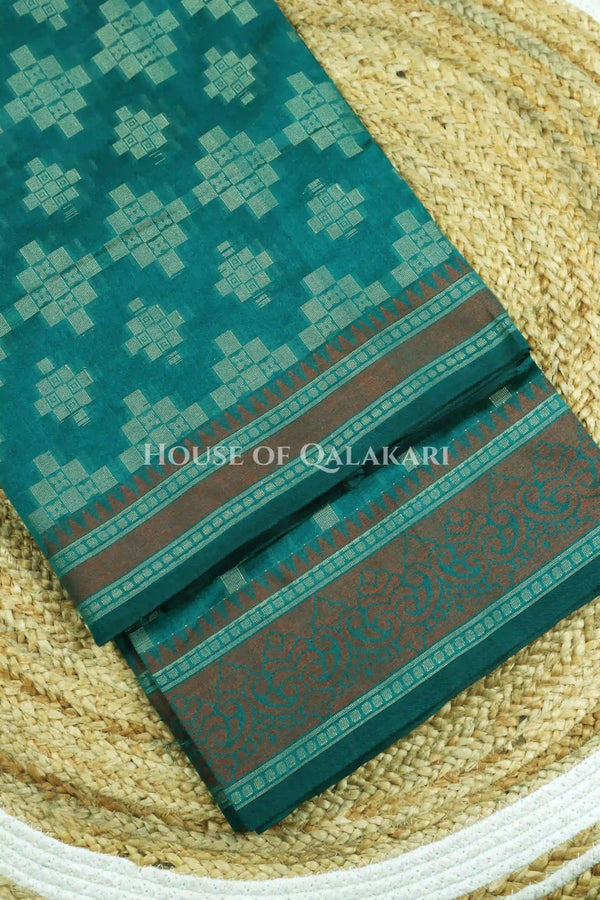 Blue-Green Banarasi Mulmul cotton patola Saree with Geometric Floral Cross Buti & contrast rust-maroon Border