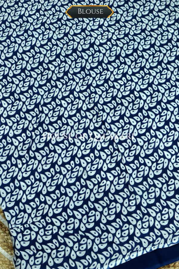Indigo Blue Bagru Mulmul cotton Saree with Off-White Prints and floral vine border