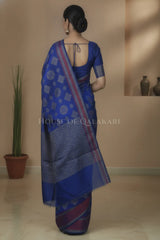 Blue Banarasi Mulmul cotton patola Saree with geometric resham butis & contrast wine Border