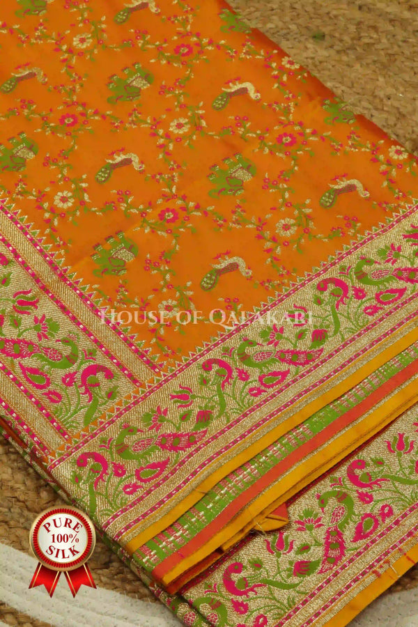 Banarasi Pure Satin Silk Shikargah Saree in rusty orange with pink & green floral border